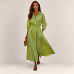 Valvet Oak House Lana lime green cotton midi dress with a collar and long sleeves worn by a woman
