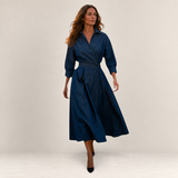 Valvet Oak House Lana dark blue denim midi dress with a collar and wrap-style waist worn by a woman