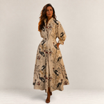 Valvet Oak House Lana cotton midi dress with crane print, collar, and side pockets worn by a model