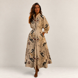 Valvet Oak House Lana cotton midi dress with crane print, collar, and side pockets worn by a model