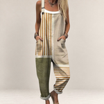 Valvet Oak House loose-fit printed jumpsuit with wide legs, adjustable straps, and side pockets in neutral tones.