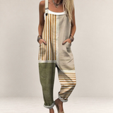 Valvet Oak House loose-fit printed jumpsuit with wide legs, adjustable straps, and side pockets in neutral tones.