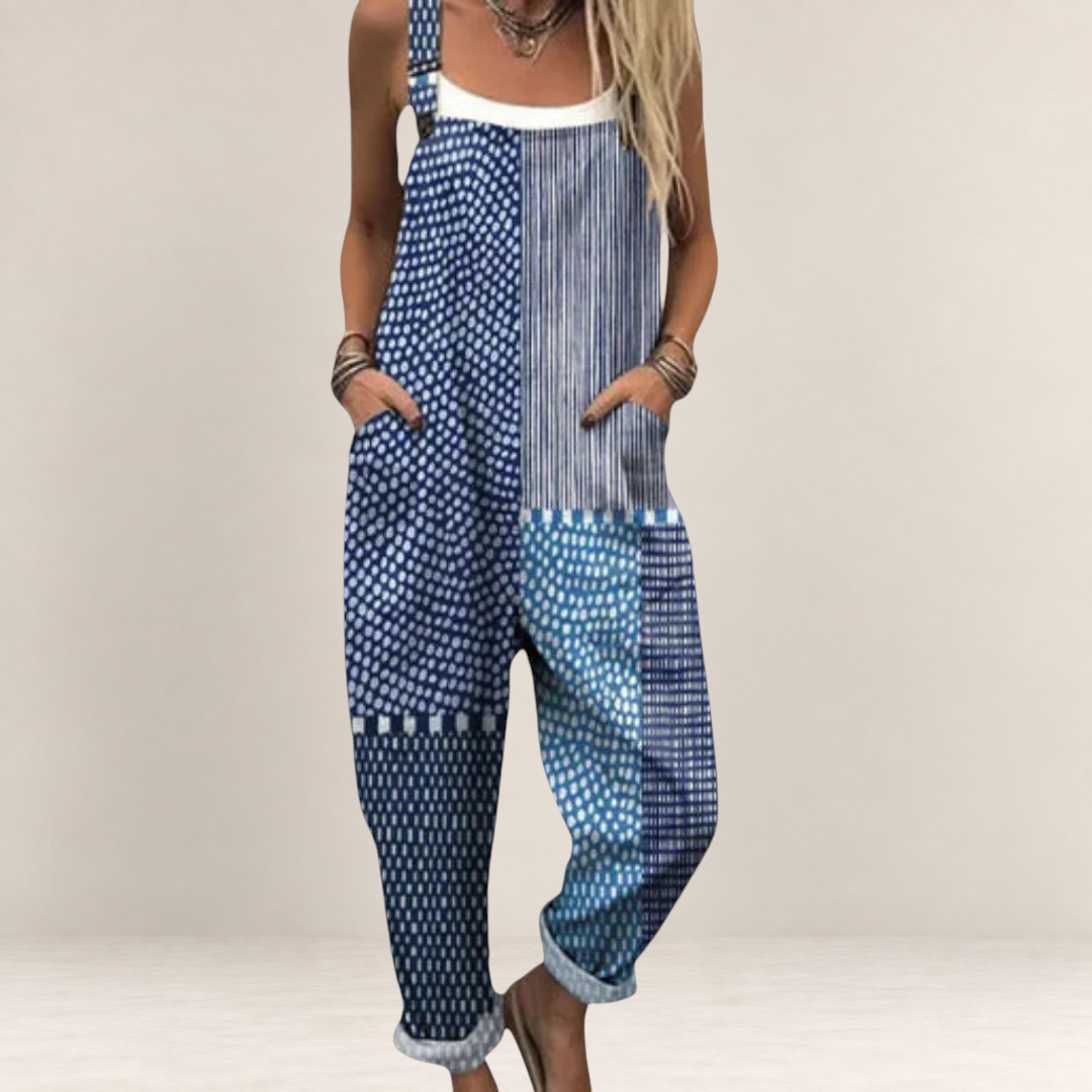 Valvet Oak House blue printed loose-fit jumpsuit with wide legs, adjustable straps, and side pockets on a model.