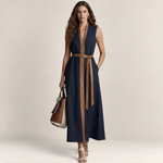 Valvet Oak House navy blue linen blend midi dress with brown leather trim and belt worn by a model with a handbag.