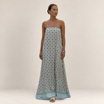 Valvet Oak House strapless maxi dress featuring a light blue and geometric pattern on a model against a neutral wall
