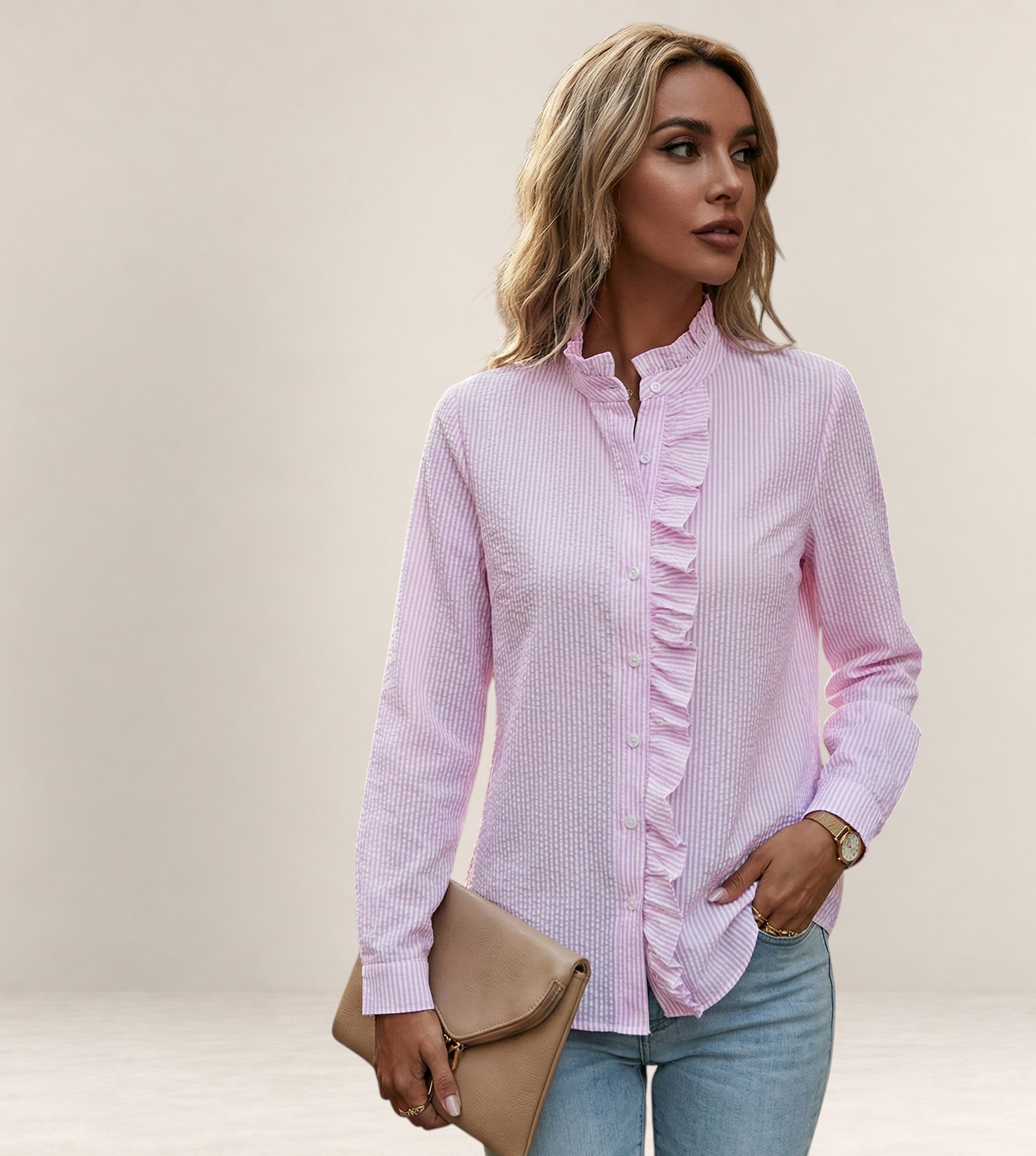 Valvet Oak House light pink striped button-down shirt with ruffled trim worn by a woman with jeans and a clutch bag