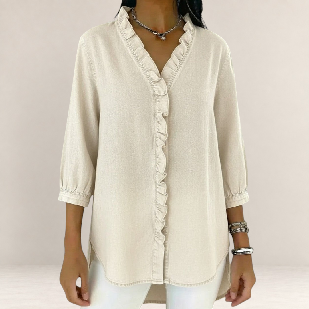 Valvet Oak House Elena beige blouse with delicate ruffles, V-neck, and three-quarter sleeves on a model