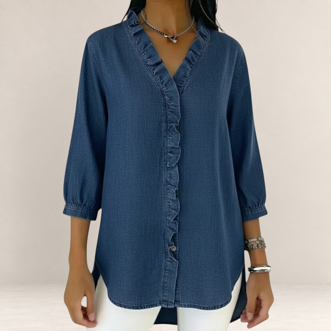 Valvet Oak House denim blouse featuring a V-neck with delicate ruffles, three-quarter sleeves, and a loose fit.