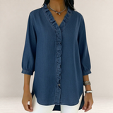 Valvet Oak House denim blouse featuring a V-neck with delicate ruffles, three-quarter sleeves, and a loose fit.