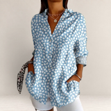 Valvet Oak House light blue button-down shirt with white abstract leaf pattern, long sleeves, and front pockets.