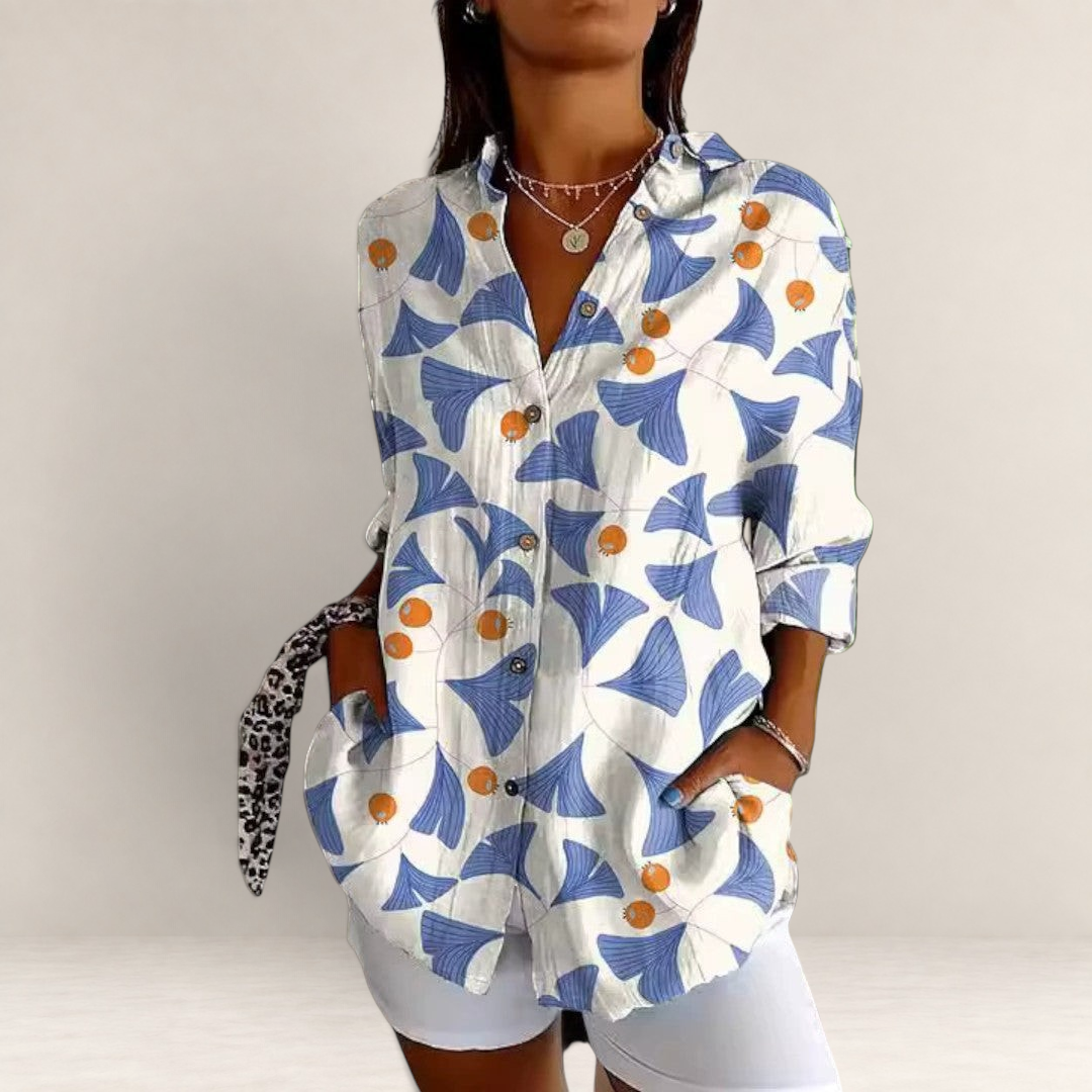 Valvet Oak House long-sleeve button-down shirt with blue and orange botanical print on a white background