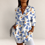 Valvet Oak House long-sleeve button-down shirt with blue and orange botanical print on a white background