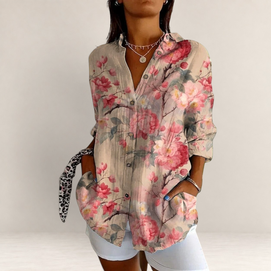 Valvet Oak House long-sleeve blouse with vibrant red and pink floral print, classic collar, and button-down front.