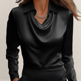 Valvet Oak House black satin blouse with a draped neckline and classic collar worn by a woman