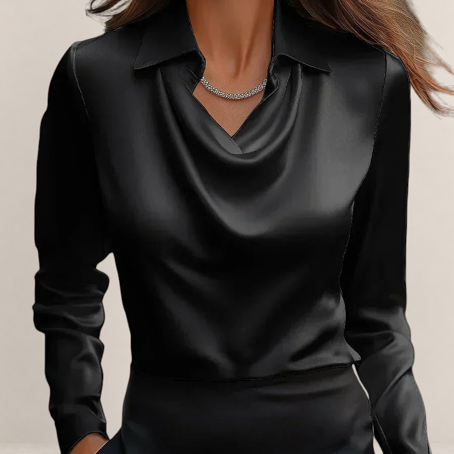 Valvet Oak House black satin blouse with a draped neckline and classic collar worn by a woman