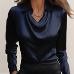 Valvet Oak House navy blue satin blouse with a draped cowl neckline and classic collar worn by a woman
