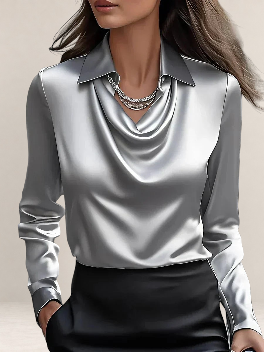 Valvet Oak House white satin blouse with a draped cowl neckline and classic collar, styled for a professional look.