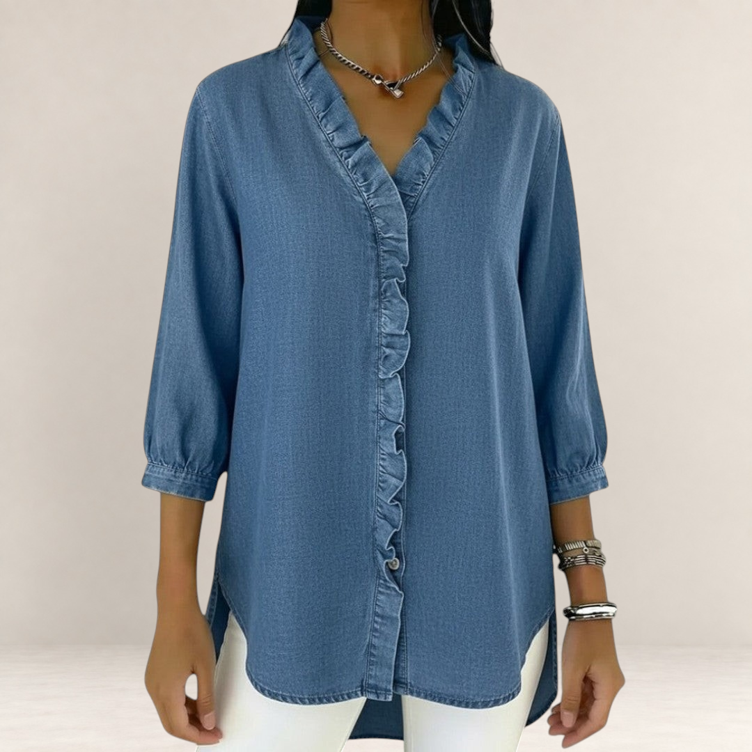 Valvet Oak House blue denim-look blouse with ruffled V-neck and three-quarter sleeves on a model