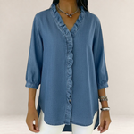 Valvet Oak House blue denim-look blouse with ruffled V-neck and three-quarter sleeves on a model