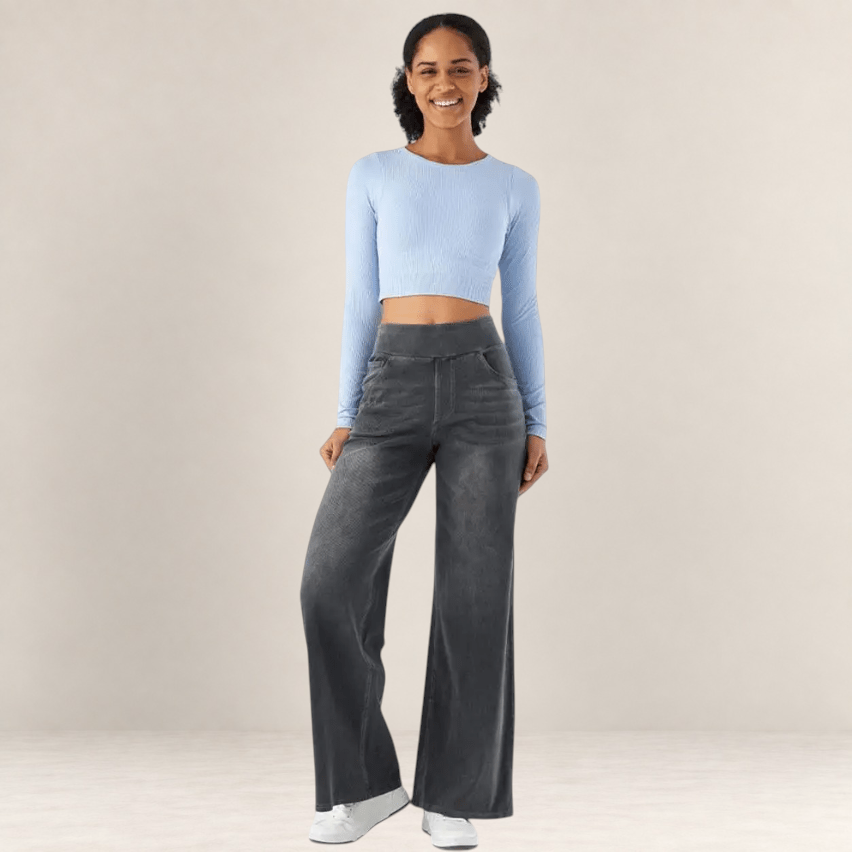 Valvet Oak House model wearing charcoal grey wide-leg trousers with an elastic waistband and a light blue crop top