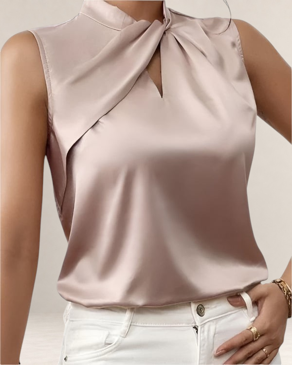 Valvet Oak House sleeveless satin blouse in champagne pink with a draped high neckline and elegant keyhole detail.