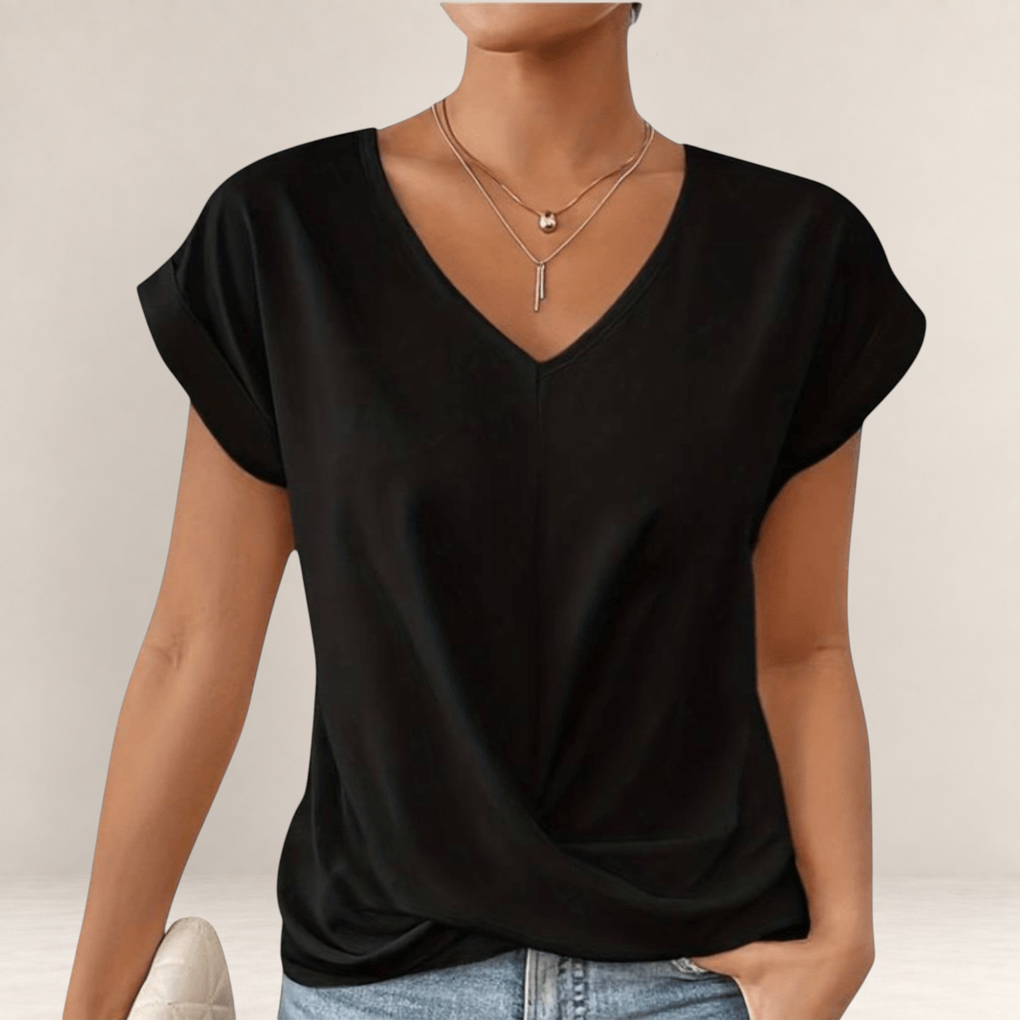 Valvet Oak House black V-neck t-shirt with short cuffed sleeves and a flattering draped waist design