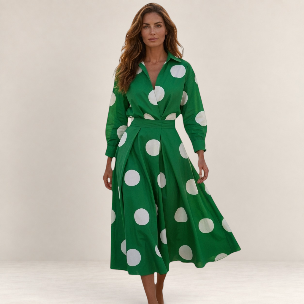 Valvet Oak House Lana green cotton midi dress with white polka dots, long sleeves, and a classic collar on a model.